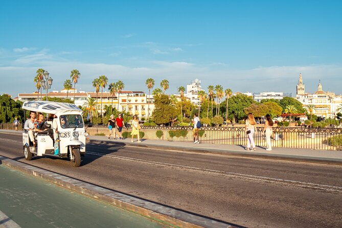 Tour Welcome Seville with Local Guide in Eco Tuk Tuk Private - Plaza de España and Maria Luisa Park: The Expo-Era Postcard