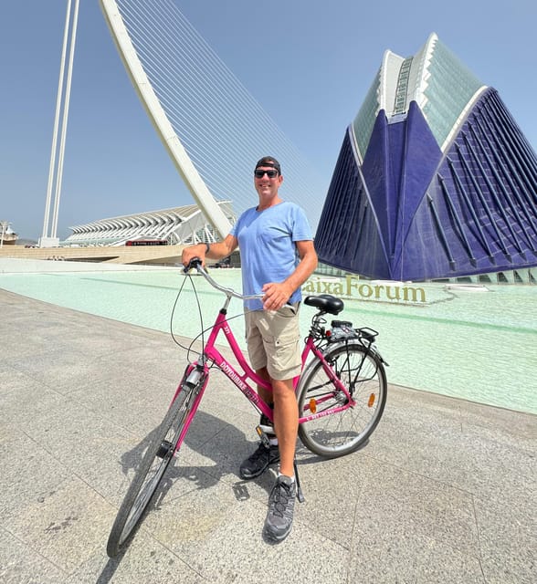 Valencia: City Highlights Guided Bike Tour - Stop-by-stop breakdown: City Hall, Central Market, and the old-town power trio