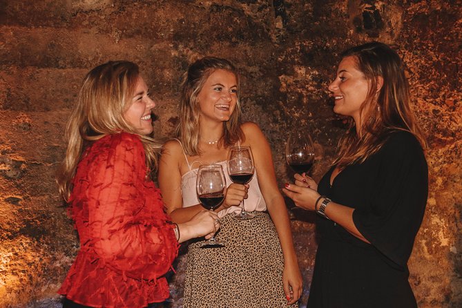 Valencia Old Town Tour with Wine & Tapas in 11th Century Historic Monument - Civil Gothic architecture and iconic plazas: the small clues that add up