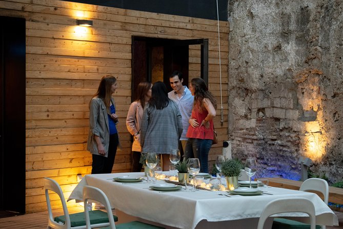 Valencia Old Town Tour with Wine & Tapas in 11th Century Historic Monument - Barrio del Carmen: the dining shift into a private 11th-century monument