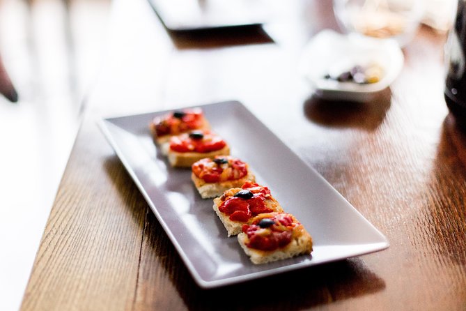 Valencia Old Town Tour with Wine & Tapas in 11th Century Historic Monument - Tapas and paella with regional wines: how the pairing changes the way you taste