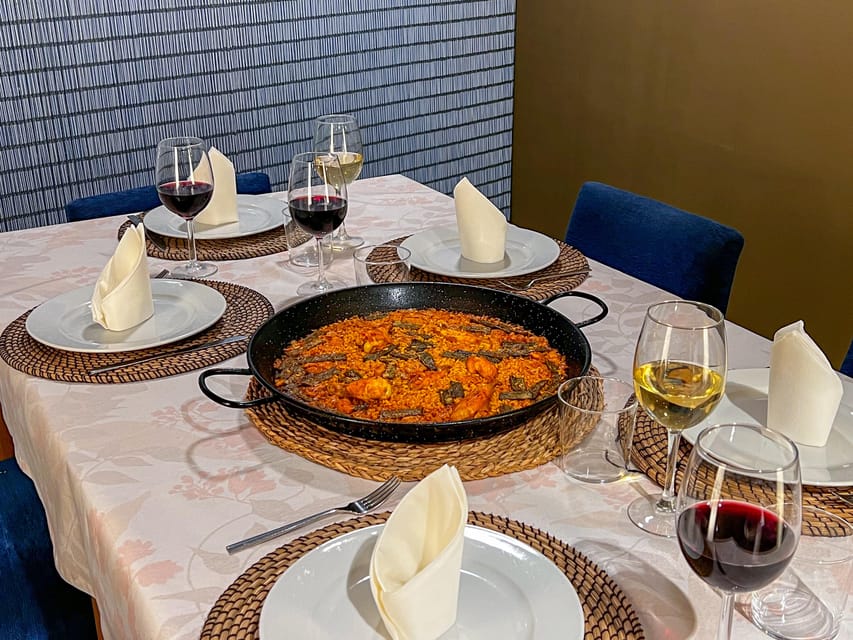 Valencia: Paella Cooking Class with Central Market Tour - Tapas, Wine Pairing, and the Pace of the Evening