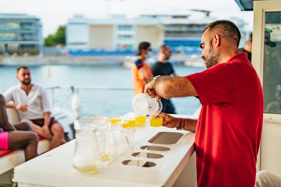 Valencia: Sunset or Daytime Catamaran Cruise with Drink - Seats, comfort, and how to dress for Valencia sea wind