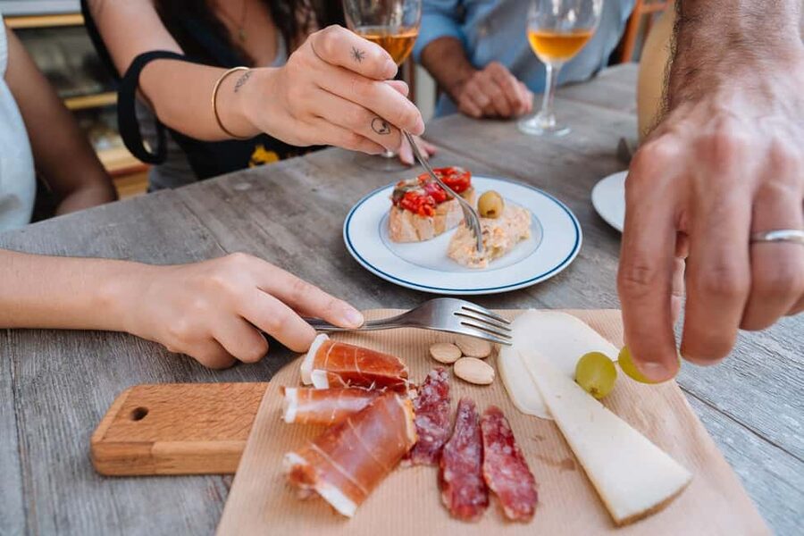 Valencia: Tapas and Drinks Evening Tour - Stop 3: Cocas, Local Sweets, and a Chance to Slow Down