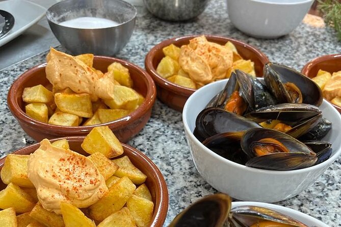 Valencian paella cooking class, tapas and visit to Ruzafa market. - Cooking Valencian Paella the Right Way: Chicken and Rabbit, Step by Step