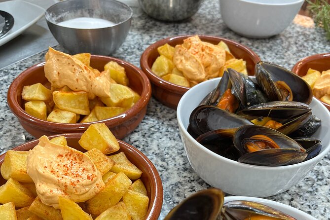 Valencian Paella Cooking Class, Tapas & Sangria - Evening - Group size, hands-on level, and how to get the most out of it