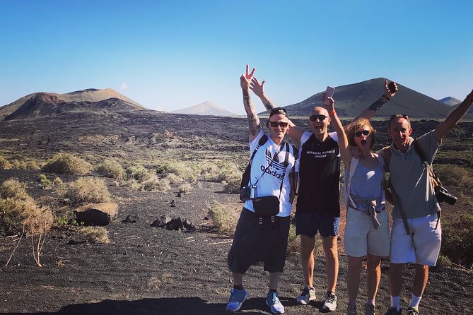 Volcano Trekking Tour (Timanfaya eruptions) - Gear that helps: poles, rain jackets, and getting steady on lava terrain