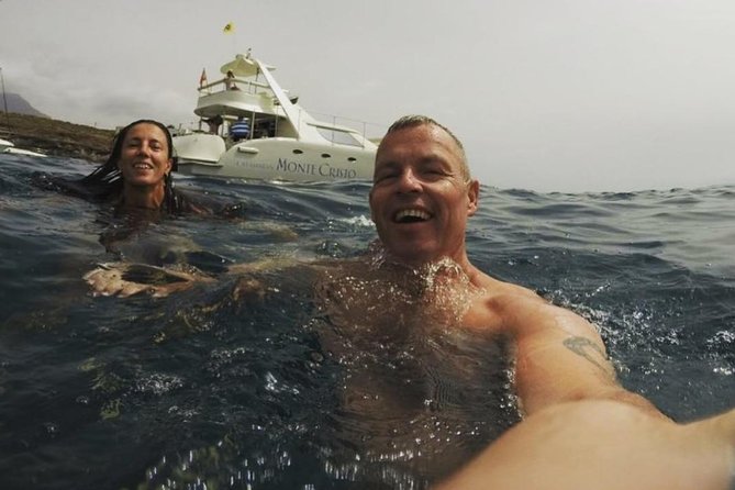 Whale Watching Catamaran Cruise with Transfer, Buffet by MC - Onboard Comfort, Sun Decks, and the Included Buffet